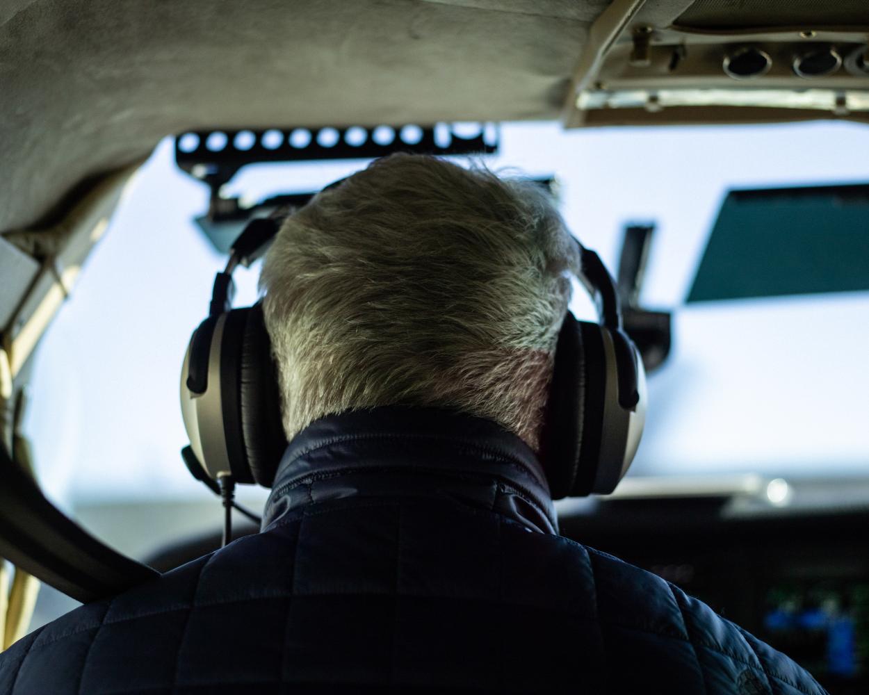 Pilo looking out the front of the plane