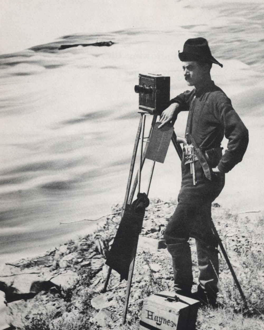 Man taking a photo with a 1880s camera