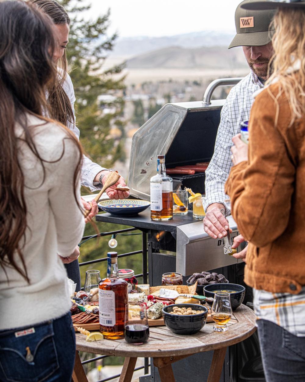 whiskey dinner party in daylight